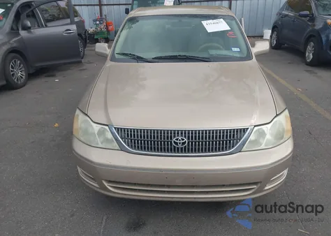 2001 Toyota Avalon Xl z USA, uszkodzony, nr VIN 4T1BF28B11U173959